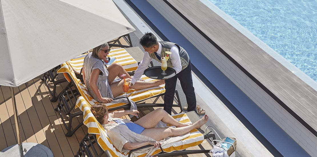 Enjoy a cocktail, whilst basking on a sun lounger by the pool